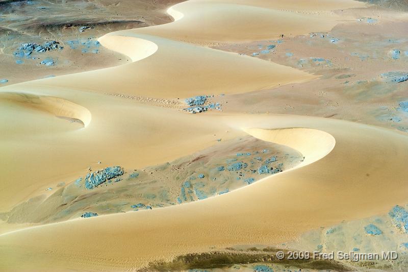 20090603_123251 D3 X1.jpg - The different colors of the landscape is also reflective of the changes in mineral content.  Many minerals are mined in Namibia.   It is one of the leading producers of diamonds.  Uranium is also mined here